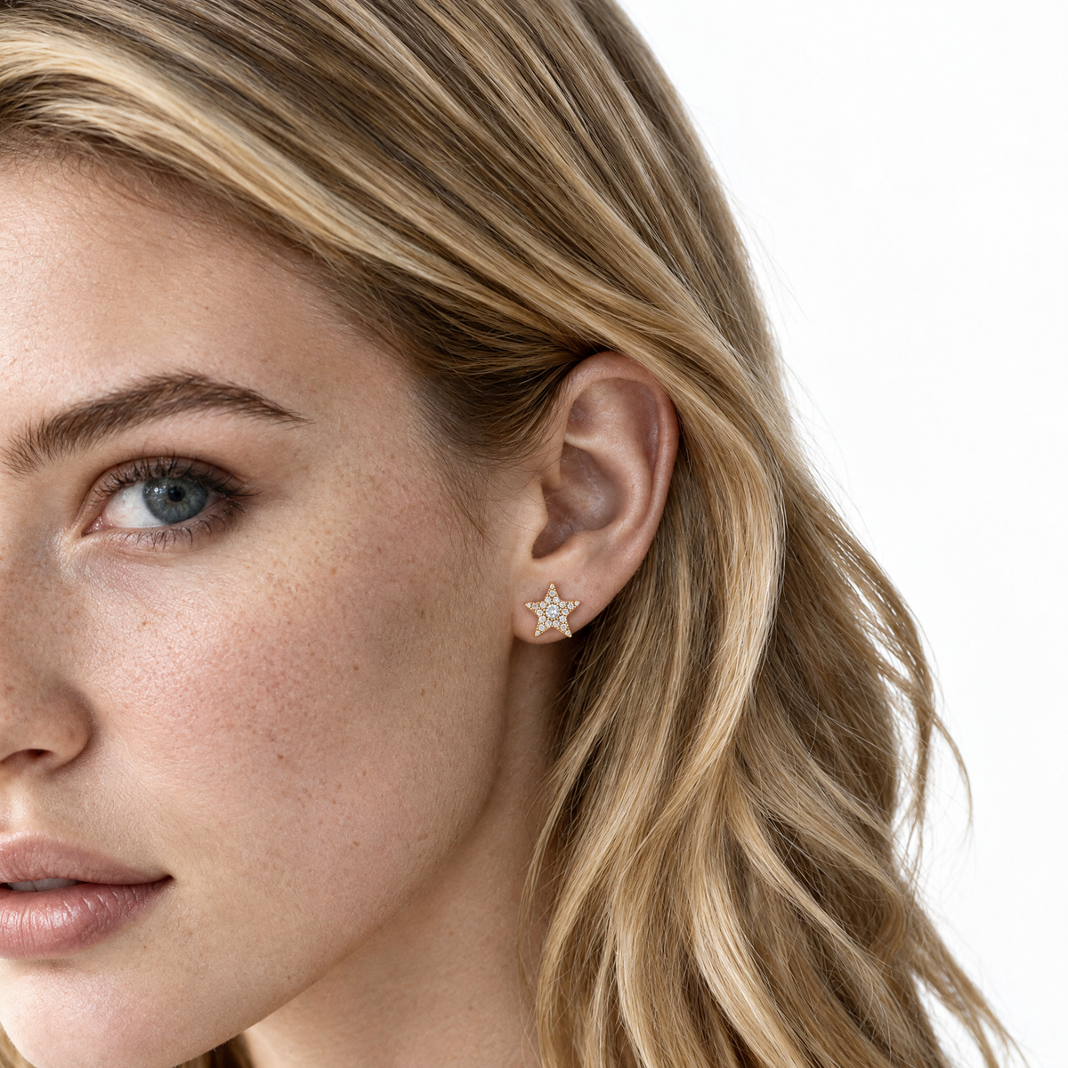 .17ct 14k Yellow Gold Diamond Star Stud Earrings on model, SKU 150-6509