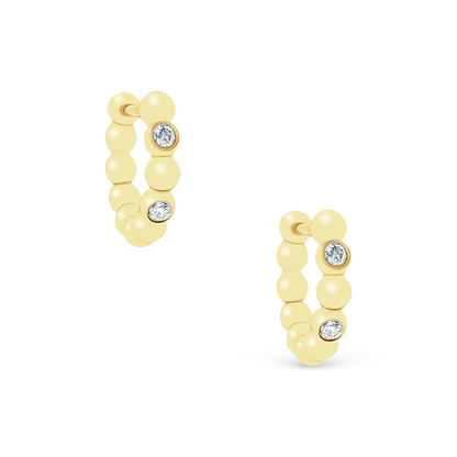 .08ct 14k Yellow Gold Diamond Huggys — photo 1 of 2